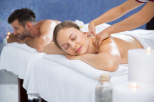 Couple massage at Shangri-La Spa offering luxury relaxation and wellness experience